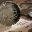 The rupee rose 5 paise to 77.52 against the dollar, as local equities continued to rise